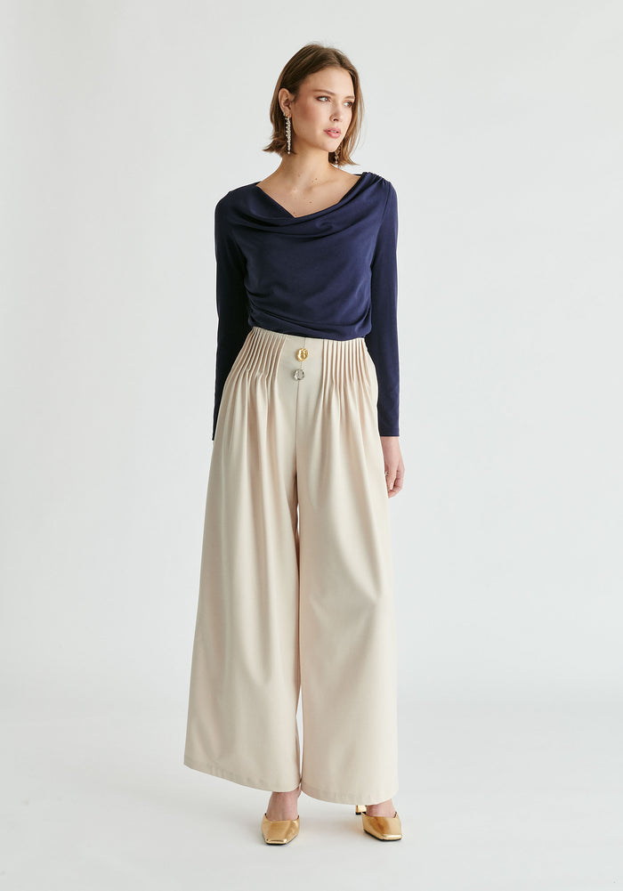 Wide Leg Trousers with Pleated Waist Detail in Cream Front